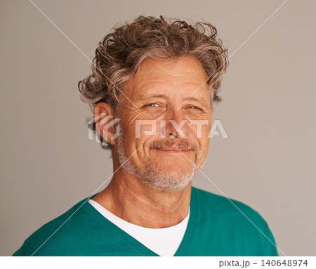 Mature man, portrait and happy in studio, peace and confidence for wrinkles on brown background. Male person, positive face and proud of wellness or health, smile and satisfaction on mockup space 140648974