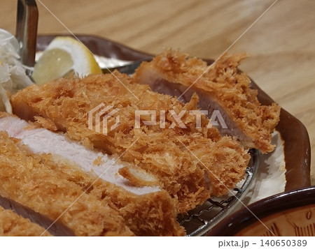 Sliced Tonkatsu Pork Cutlet on Japanese Ceramic Plate Sliced Tonkatsu Pork Cutlet on Japanese Ceramic Plate 140650389