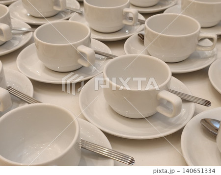 Empty Porcelain Teacups Arranged Neatly for Catered Event Empty Porcelain Teacups Arranged Neatly for Catered Event 140651334