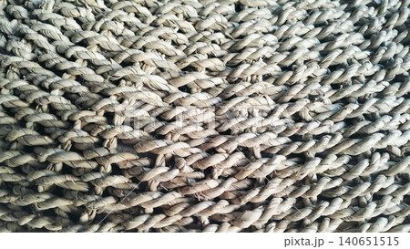 Natural woven pouf ottoman stool for living room interior 140651515
