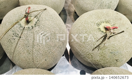 Fresh whole cantaloupe muskmelons background on display at market. 140652673