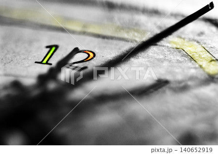 Clock hand approaching twelve macro conceptual abstract deadline image 140652919