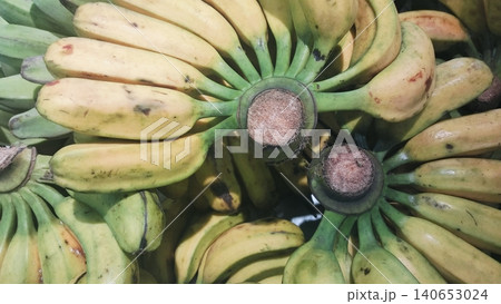 Fresh bunches of lady finger bananas with visible stems background. 140653024