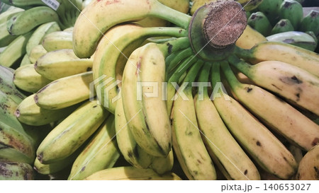 Fresh bunches of lady finger bananas with visible stems background. 140653027