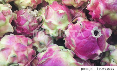 Close-up of fresh whole pink dragon fruits background Close-up of fresh whole pink dragon fruits background 140653033