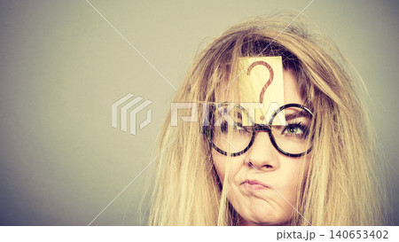 Tired crazy woman after intensive thinking 140653402