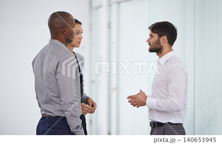 Men, woman and group discussion in office with ideas, huddle or listen in collaboration at company. Business people, teamwork and meeting with advice in scrum with conversation in corporate workplace Men, woman and group discussion in office with ideas, huddle or listen in collaboration at company. Business people, teamwork and meeting with advice in scrum with conversation in corporate workplace 140653945