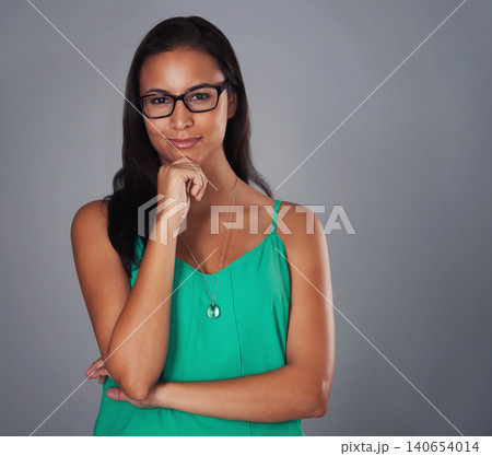 Happy, gray background and portrait of business woman with glasses for career, work and job. Professional, thinking and isolated person with confidence, company pride and positive attitude in studio Happy, gray background and portrait of business woman with glasses for career, work and job. Professional, thinking and isolated person with confidence, company pride and positive attitude in studio 140654014