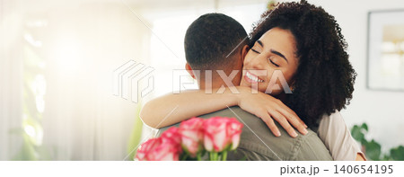 Couple, hug and flowers gift for valentines day with love for surprise bouquet for relationship, anniversary or date. Man, woman and embrace in home with roses for marriage, celebration or present Couple, hug and flowers gift for valentines day with love for surprise bouquet for relationship, anniversary or date. Man, woman and embrace in home with roses for marriage, celebration or present 140654195