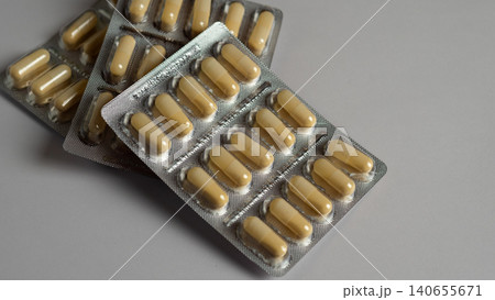 Magnesium vitamins MG in a blister on a white background 140655671