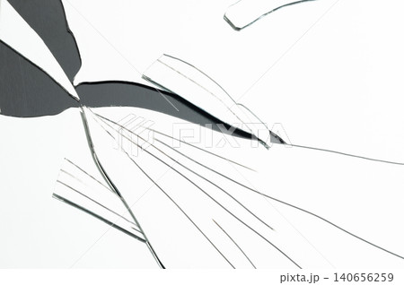 Art installation shows torn paper design on white backdrop in gallery 140656259