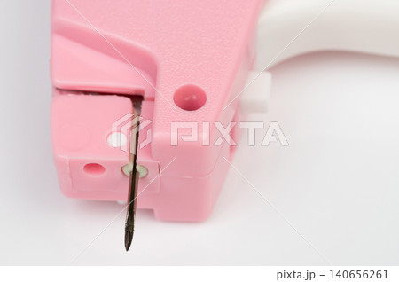 Craft tool on white background with focus on needle Craft tool on white background with focus on needle 140656261