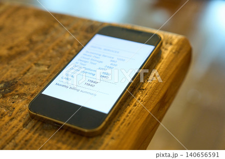 スマートフォンに表示されたデジタルサービスの月額利用明細 スマートフォンに表示されたデジタルサービスの月額利用明細 140656591