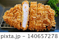 Japanese Tonkatsu Breaded Pork Cutlet Sliced on Rack Close Up 140657278