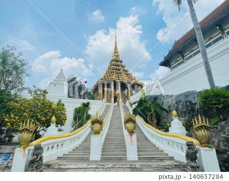 Golden Mondop of Wat Phra Phutthabat Temple with Naga Stairs in Saraburi, Thailand - April 22, 2026 Golden Mondop of Wat Phra Phutthabat Temple with Naga Stairs in Saraburi, Thailand - April 22, 2026 140657284
