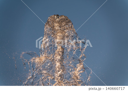 Splashes and jets of water against light background. Splashes and jets of water against light background. 140660717