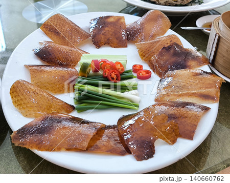 Crispy Peking Duck Skin with Garnish Crispy Peking Duck Skin with Garnish 140660762