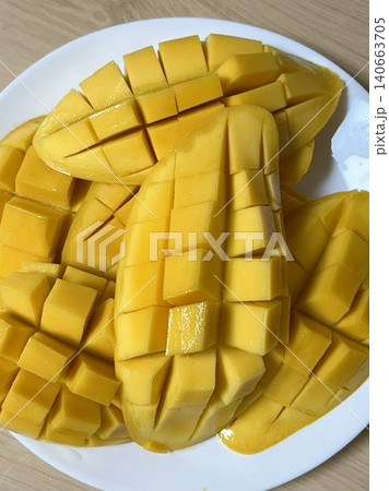 Mango, a sweet and juicy tropical fruit, known for its vibrant color and rich flavor. Perfect for eating fresh, in smoothies, or as a dessert topping. Mango, a sweet and juicy tropical fruit, known for its vibrant color and rich flavor. Perfect for eating fresh, in smoothies, or as a dessert topping. 140663705