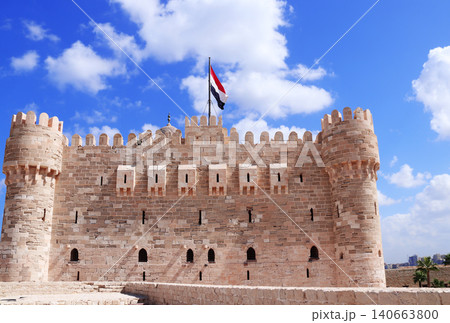 Citadel of Qaitbay (15th-century fort), Alexandria, Egypt, Africa. Famous landmark Fort of Qaitbay (Bey Citadel), located on Mediterranean sea coast. Topic of vacation, travel, trip abroad, cruises 140663800