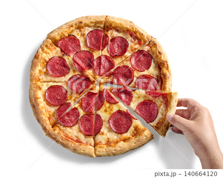 Hand Taking a Slice of Freshly Baked Pepperoni Pizza Isolated on White background Hand Taking a Slice of Freshly Baked Pepperoni Pizza Isolated on White background 140664120