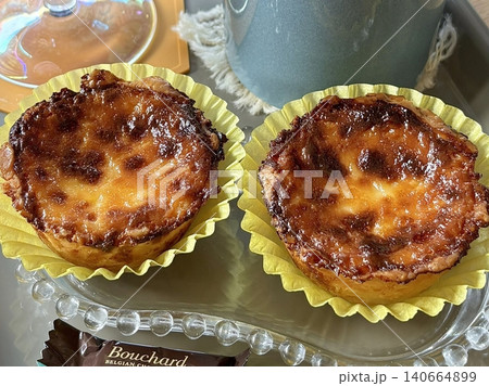Golden egg tart with a flaky, buttery crust and a rich, creamy custard center. A deliciously satisfying treat for dessert or a light snack, blending texture and flavor perfectly. 140664899