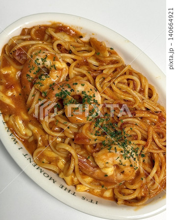 Classic spaghetti coated in rich tomato sauce, offering a simple yet delicious combination of tangy, savory flavors perfect for a comforting meal. Classic spaghetti coated in rich tomato sauce, offering a simple yet delicious combination of tangy, savory flavors perfect for a comforting meal. 140664921
