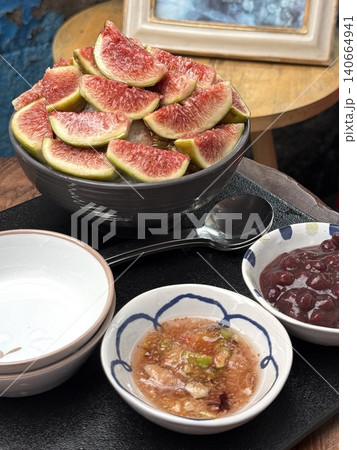 Refreshing fig bingsu topped with sweet, ripe figs and soft shaved ice. A naturally fruity, delicate Korean dessert that blends creamy, icy, and juicy flavors in every cool, elegant spoonful. 140664941