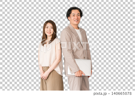 A male and female businessman standing with a laptop computer. A male and female businessman standing with a laptop computer. 140665078
