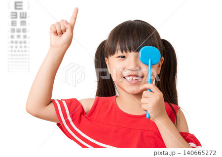 Asian little girl eye test, covering one eye, vision examination, child healthcare, ophthalmology concept 140665272