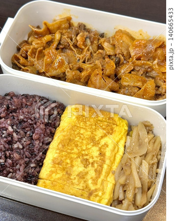 A traditional Korean dosirak, beautifully arranged with rice, assorted banchan, and savory proteins. Balanced and visually inviting, it’s a portable meal packed with vibrant flavors. A traditional Korean dosirak, beautifully arranged with rice, assorted banchan, and savory proteins. Balanced and visually inviting, it’s a portable meal packed with vibrant flavors. 140665433