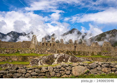 Panoramic view of Machu Picchu ruins with Huayna Picchu in background, Peru 140665646