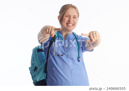 Enthusiastic Medical Student Pointing Forward Enthusiastic Medical Student Pointing Forward 140666505