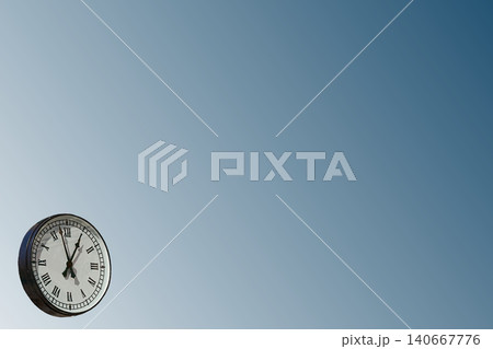 Clock with Roman numerals on blue gray.Place for text Clock with Roman numerals on blue gray.Place for text 140667776