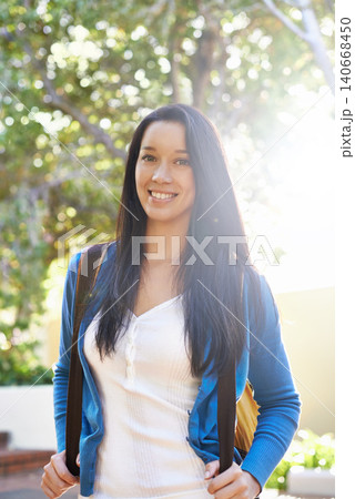 Happy woman, portrait and student with bag on campus for back to school, learning or education. Young female person or academic learner with smile and backpack in nature at college or university 140668450