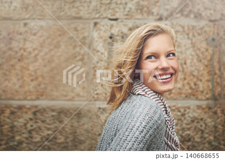 Fashion, wall background and woman in city laughing with confidence, trendy clothes and style. Travel, happiness and face of person outdoors for journey on holiday, weekend and vacation in Canada Fashion, wall background and woman in city laughing with confidence, trendy clothes and style. Travel, happiness and face of person outdoors for journey on holiday, weekend and vacation in Canada 140668655