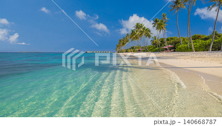 Beautiful tropical beach turquoise palm white sand. Lush island greenery bright summer day. Sunny paradise lagoon shore, idyllic exotic holiday coastal getaway Beautiful tropical beach turquoise palm white sand. Lush island greenery bright summer day. Sunny paradise lagoon shore, idyllic exotic holiday coastal getaway 140668787
