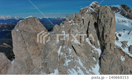Majestic rocky mountains in snow Alps Dolomites 140669153