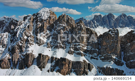 Majestic rocky mountains in snow Alps Dolomites 140669154