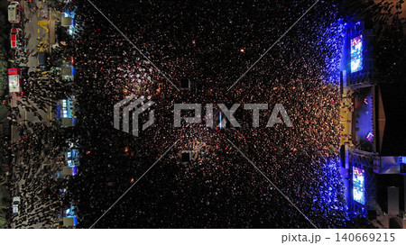 Aerial top view of crowd people at night music concert 140669215