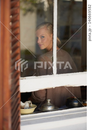 Portrait, woman and smile by window for relax with reflection, weekend break and calm expression in home. Person, face and happy with confidence, pride and casual clothes in apartment in winter 140669582