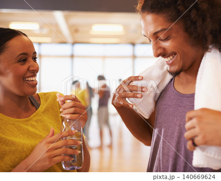 People, drinking water and hydration in dance studio, smile and relax from practice or learning routine. Partners, mineral liquid and happy for rest, break and nutrition for exercise or workout People, drinking water and hydration in dance studio, smile and relax from practice or learning routine. Partners, mineral liquid and happy for rest, break and nutrition for exercise or workout 140669624