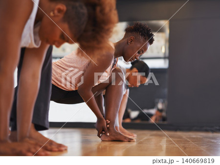 Dancer, group and stretching legs in studio for workout, exercise or vision for wellness with muscle. People, friends and dancing team in warm up, start or together for class, art and ballet on floor Dancer, group and stretching legs in studio for workout, exercise or vision for wellness with muscle. People, friends and dancing team in warm up, start or together for class, art and ballet on floor 140669819