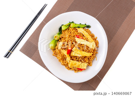 classic Chinese Stir-Fried Noodles with Eggs and Vegetables, Chow Mein in Ceramic Bowl classic Chinese Stir-Fried Noodles with Eggs and Vegetables, Chow Mein in Ceramic Bowl 140669867