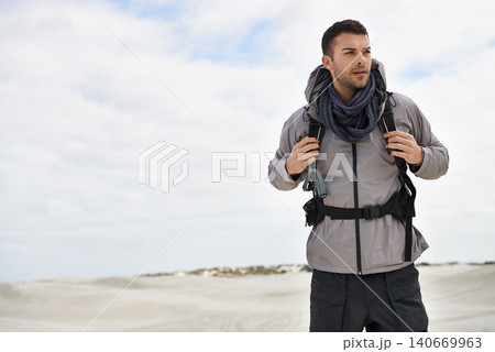 Backpack, travel or fitness man in desert for adventure, journey or resort, location and exploration. Outdoor, holiday or male backpacker in Egypt for sand dunes walking, wellness or hiking in nature Backpack, travel or fitness man in desert for adventure, journey or resort, location and exploration. Outdoor, holiday or male backpacker in Egypt for sand dunes walking, wellness or hiking in nature 140669963