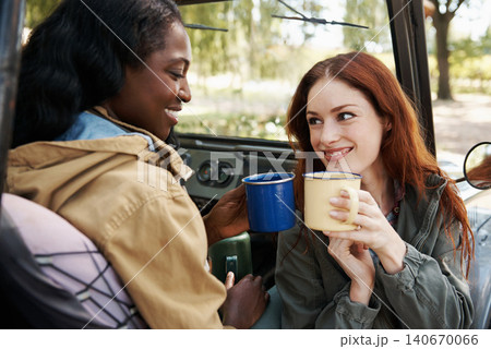 Women, coffee or relax on road trip in countryside, talking or travel adventure as friends in nature. Ladies, drinking and tea in suv on summer holiday, rest and bonding together for chat in texas Women, coffee or relax on road trip in countryside, talking or travel adventure as friends in nature. Ladies, drinking and tea in suv on summer holiday, rest and bonding together for chat in texas 140670066