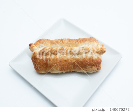 a pie on a white plate on a white background a pie on a white plate on a white background 140670272
