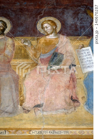 St. Luke Evangelist, detail of the Triumph of St. Thomas Aquinas, fresco by Andrea di Buonaiuto, Spanish Chapel in Santa Maria Novella Principal Dominican church in Florence, Italy 140670287