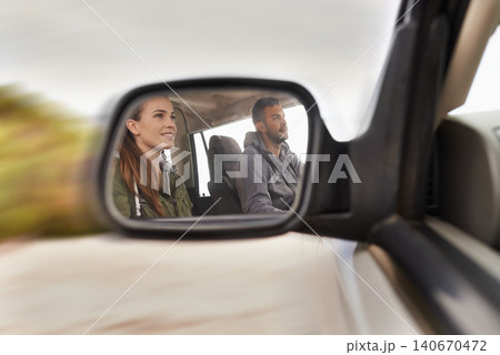 Couple, car and mirror on roadtrip with travel for adventure, vacation and reflection with happiness in countryside. Woman, man and driving in transport for holiday journey, tourism or honeymoon trip Couple, car and mirror on roadtrip with travel for adventure, vacation and reflection with happiness in countryside. Woman, man and driving in transport for holiday journey, tourism or honeymoon trip 140670472