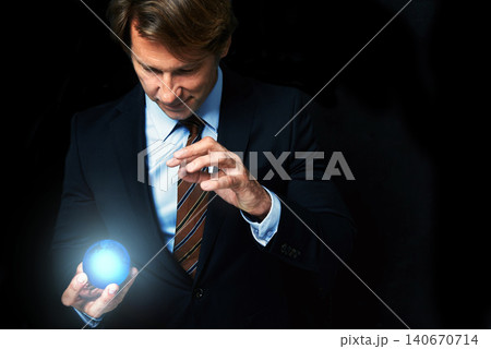 Businessman, globe and hologram for networking, global expansion and worldwide innovation in studio. Futuristic crystal, magic and professional man on black background, tech and connect for economy 140670714