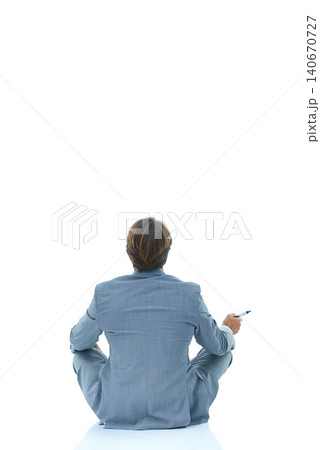 Businessman, back and relax with marker in studio for planning, brainstorming or thinking on a white background. Rear view of man, employee or model with pen for idea or solution on mockup space Businessman, back and relax with marker in studio for planning, brainstorming or thinking on a white background. Rear view of man, employee or model with pen for idea or solution on mockup space 140670727